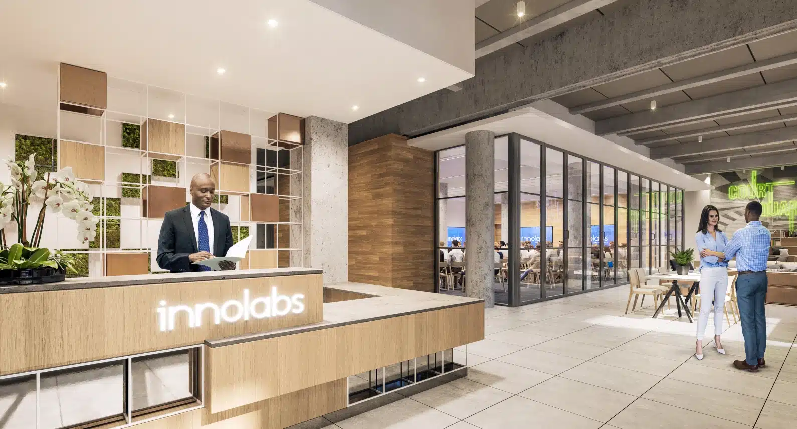 Reception area of Innolabs with a sleek modern desk and backlit company logo