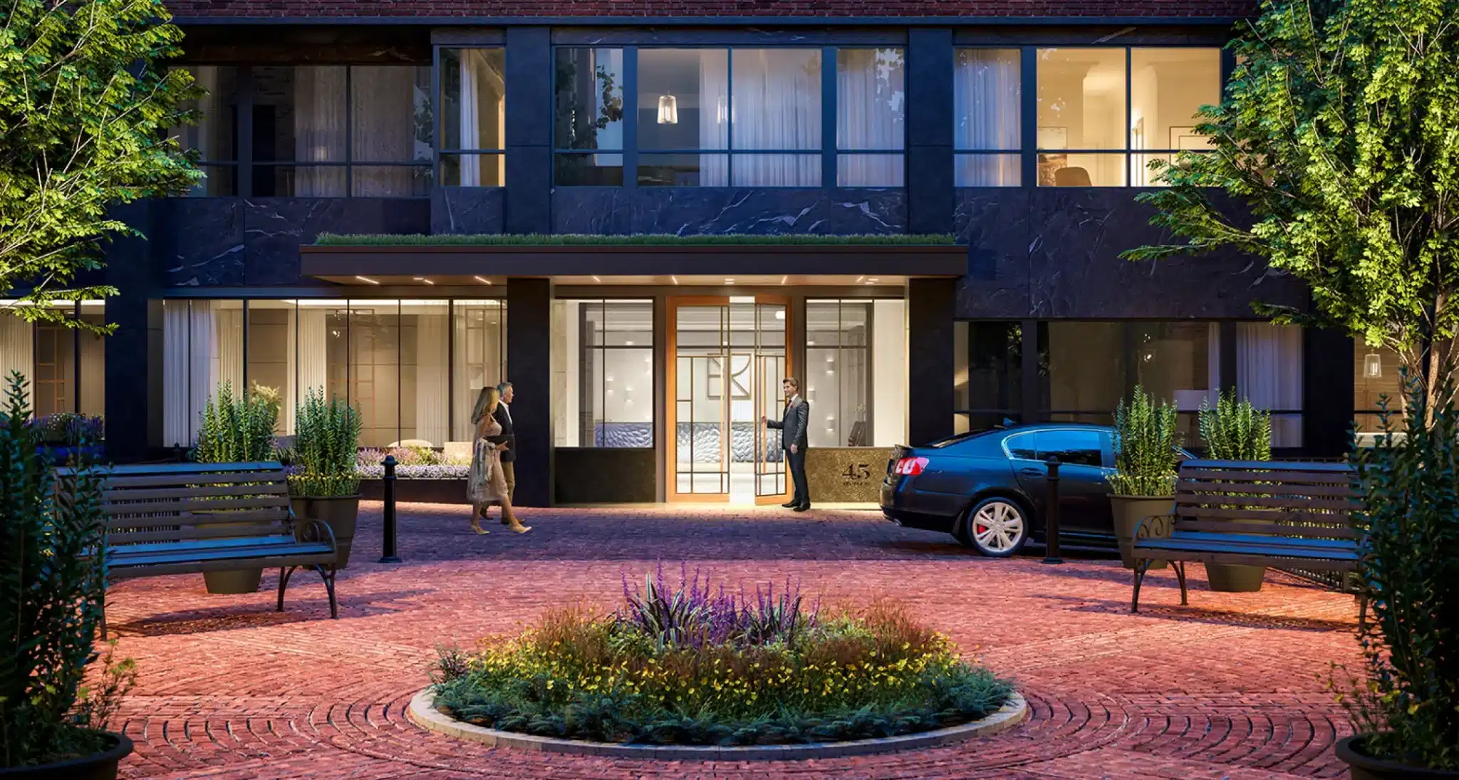 Luxury residential courtyard at The Archer, featuring lush landscaping and brick-paved pathways