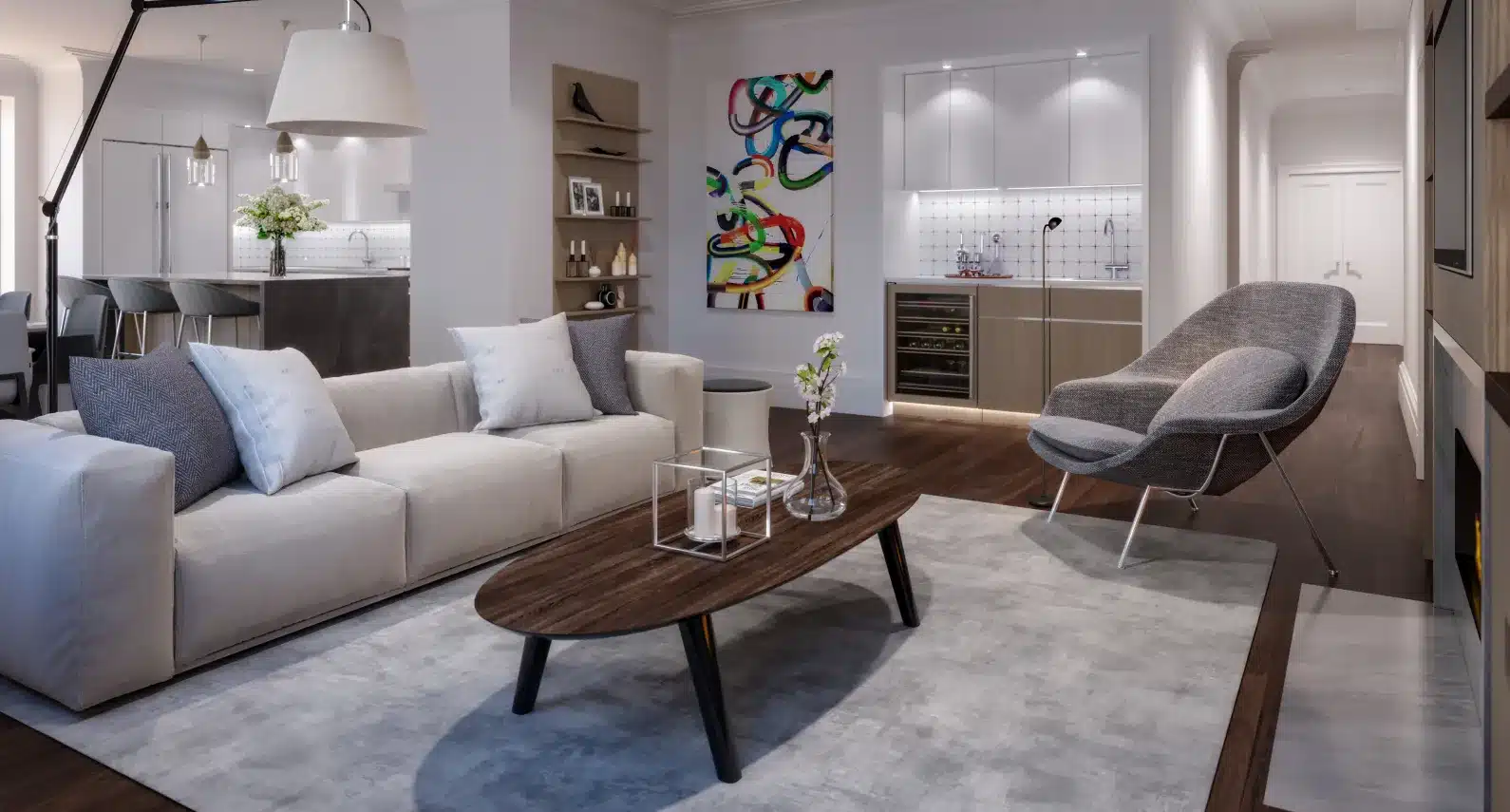 Contemporary lounge area with neutral furniture, artistic elements, and cozy lighting