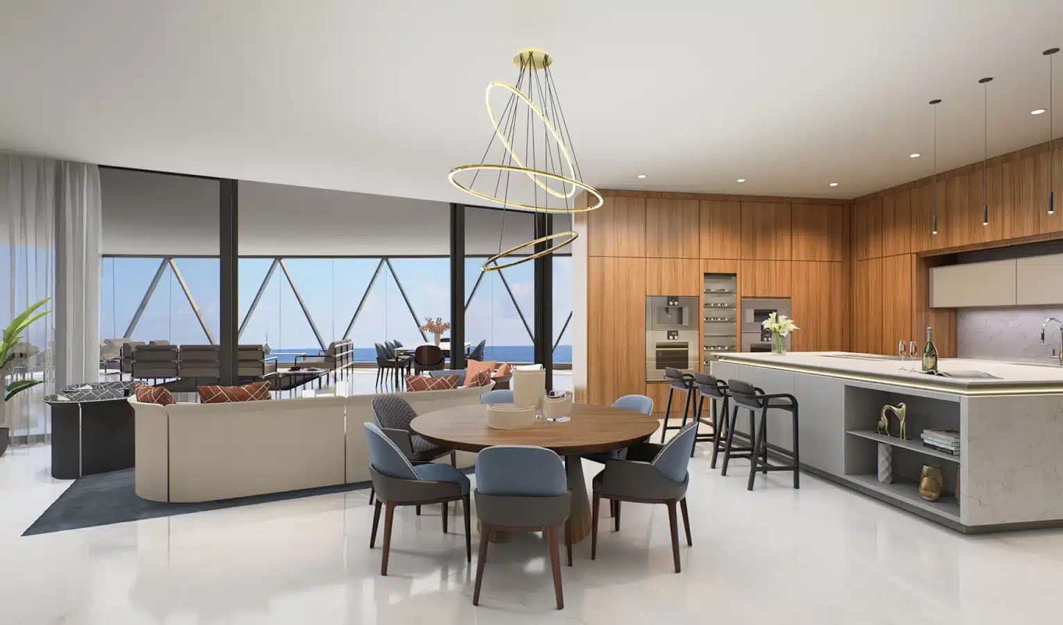 Open-concept kitchen and dining area with modern wood cabinetry and ocean views