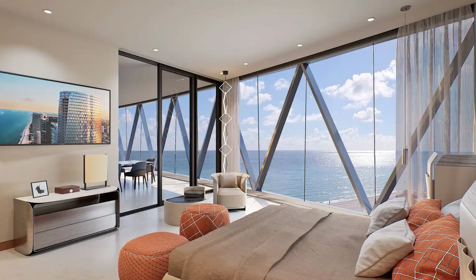 Luxury bedroom with floor-to-ceiling windows offering stunning oceanfront views