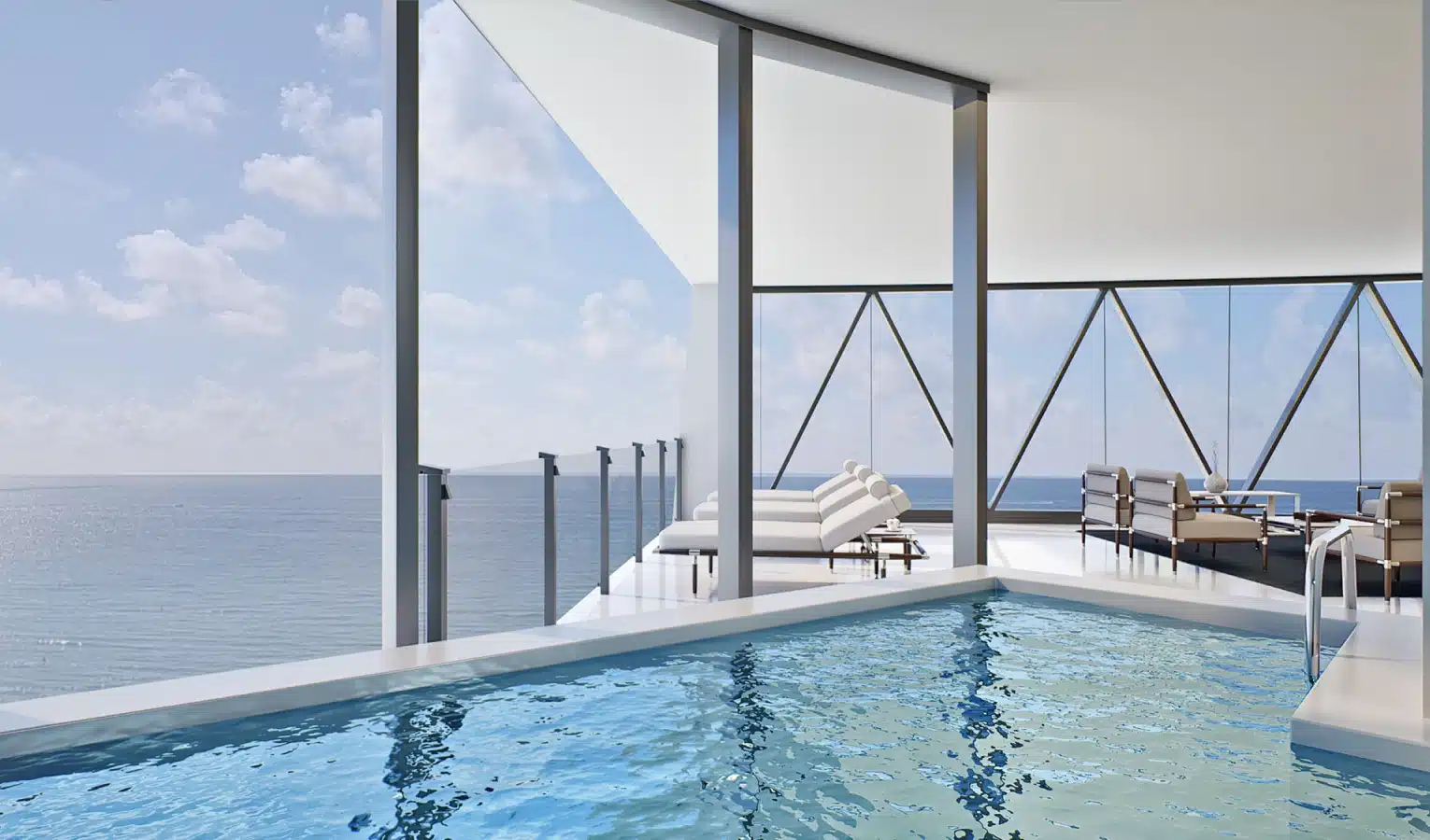 Private penthouse pool with an infinity edge overlooking the ocean and sky
