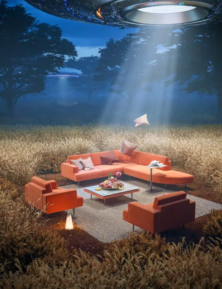 Outdoor lounge with orange sofas under a hovering UFO casting beams of light in a wheat field