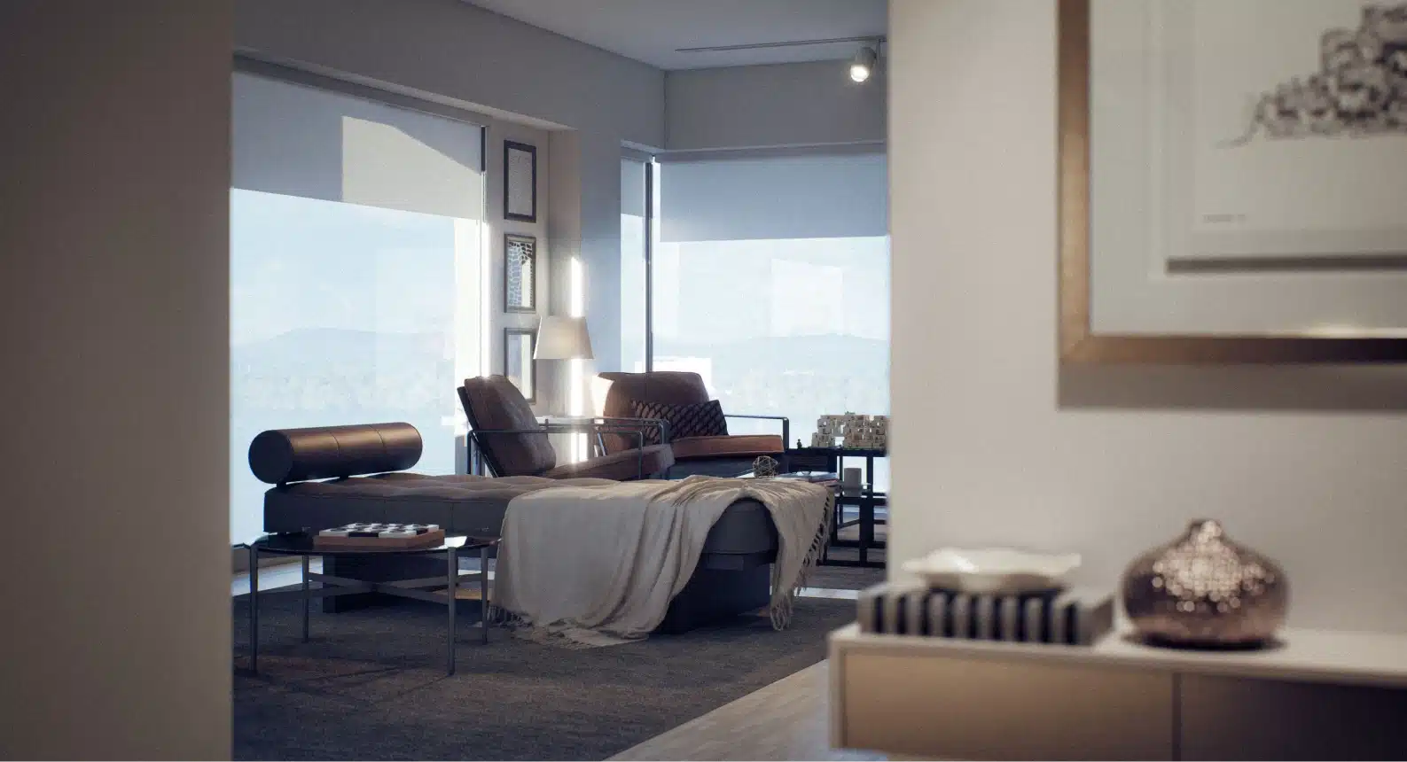 Cozy modern interior with leather seating, blanket-covered bench and scenic window views of the landscape