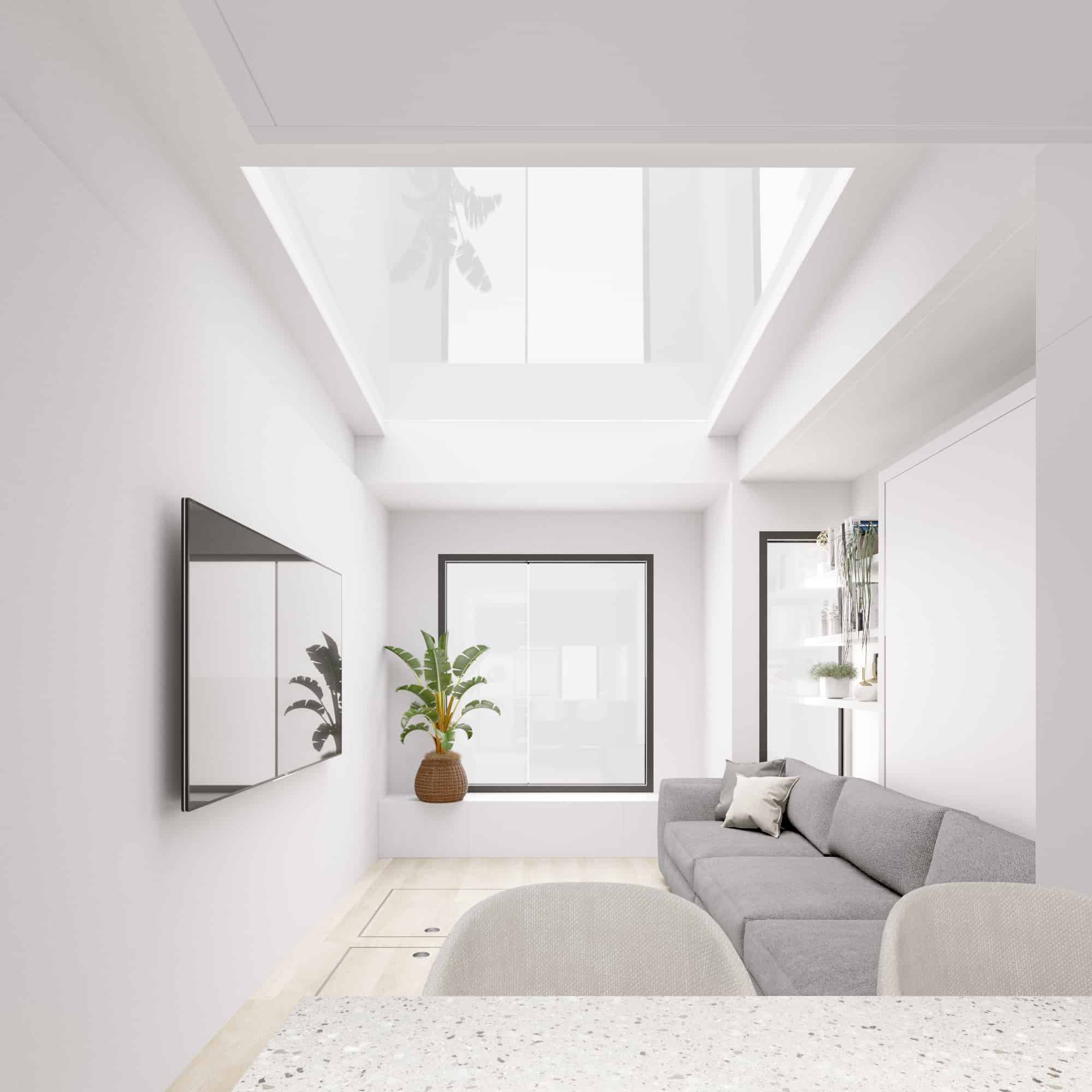 Bright modern living room with skylight and neutral furnishings in soft contemporary palette