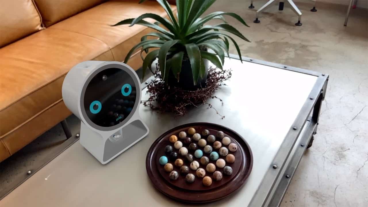 Smart home assistant placed near succulent arrangement and artistic tabletop board game display